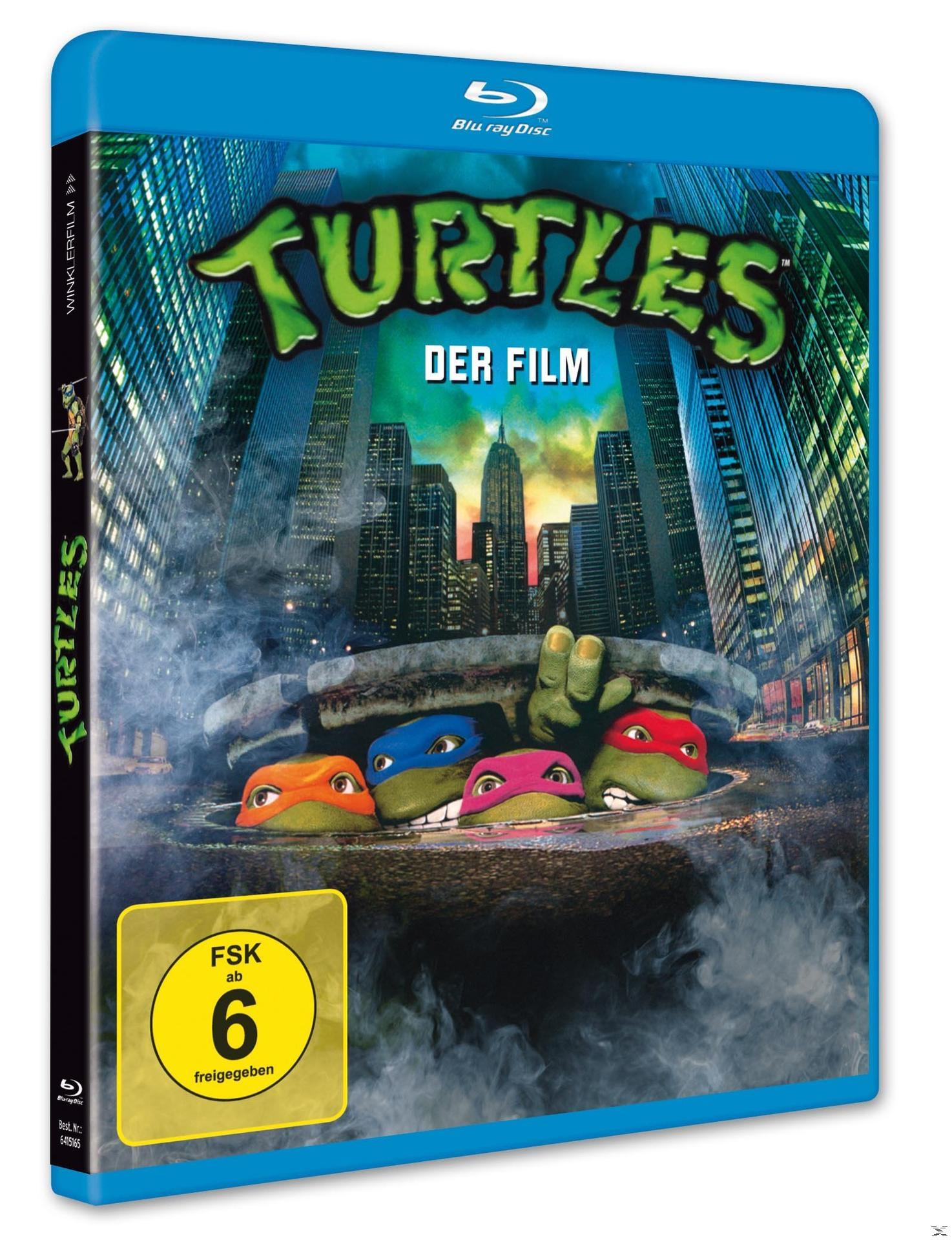 Blu-ray-Cover von 'Teenage Mutant Ninja Turtles'. Schildkröten tauchen aus der Kanalisation auf.