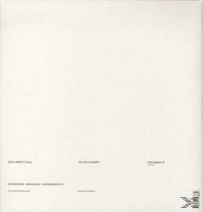 Ein schlichtes, weißes Albumcover mit minimalem Text in der unteren linken Ecke.