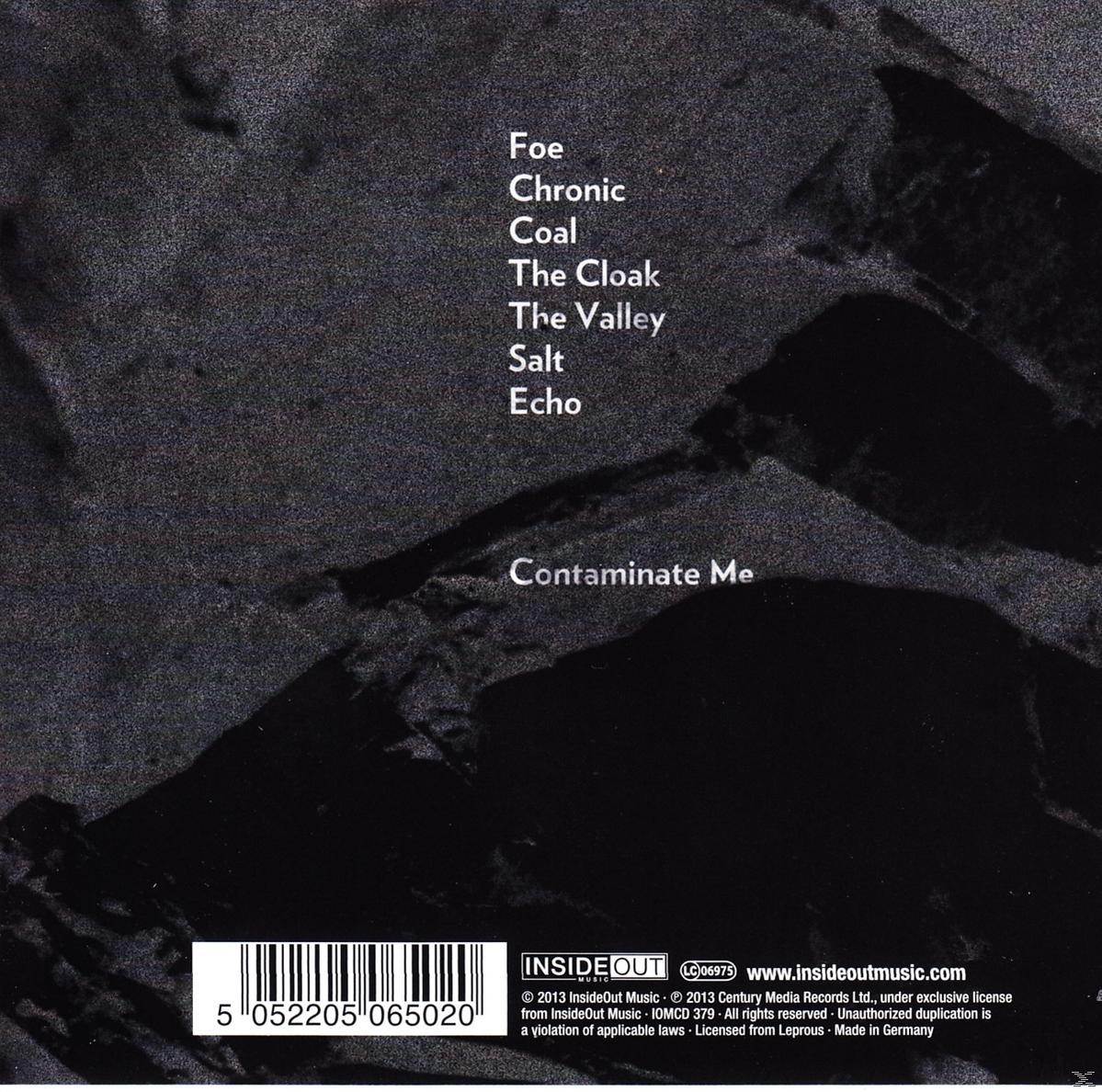 CD-Cover, schwarz und grau mit Text von Songtiteln und einem Barcode.