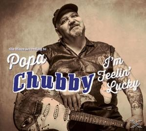 Albumcover von Papa Chubby mit Gitarre, lächelnd und mit Hut. Text: I'm Feelin Lucky.