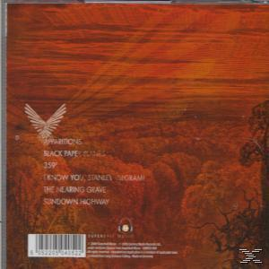 CD-Cover mit orangefarbener Landschaft und Text. Ein weißer Vogel ist sichtbar.