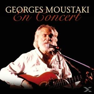 Georges Moustaki singt, spielt eine rote Gitarre, vor schwarzem Hintergrund. Text 'On Concert'.