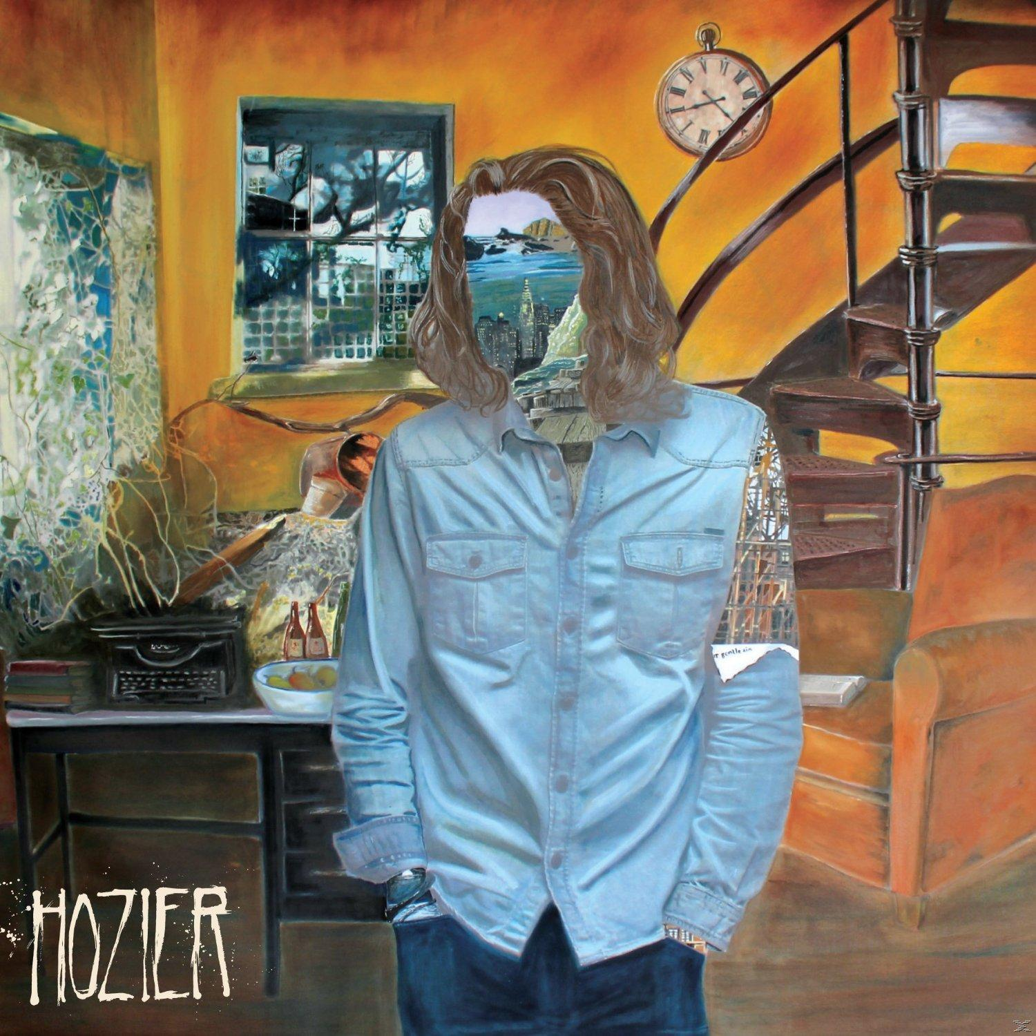 Hozier Albumcover. Figur mit landschaftsgefülltem Kopf und Körper. Interieurhintergrund.