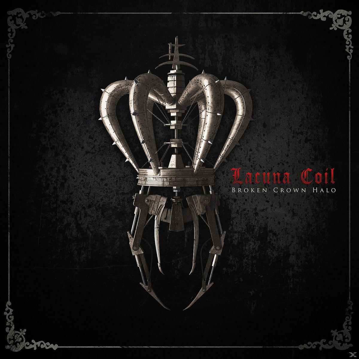 Albumcover mit metallischem Kronen-Design auf dunklem Hintergrund. Der Bandname lautet 'Lacuna Coil'.