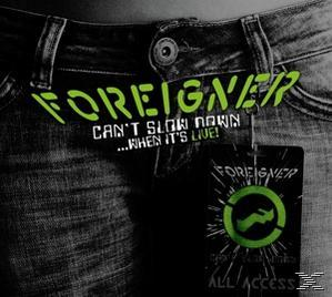 Albumcover. Jeans mit einem Etikett: Foreigner, Can't Slow Down... When It's Live! Grünes Logo.