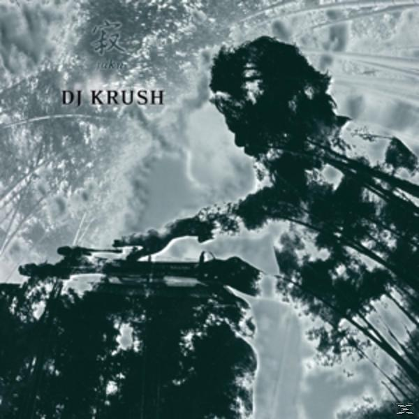 Album borítója. Egy férfi DJ-zik sötét háttérrel. A DJ Krush a művész neve.