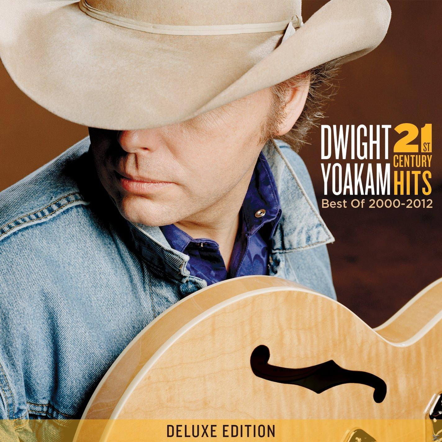 Dwight Yoakam album borítója. Kalapos férfi gitárral. Szöveg: 21st Century Hits.