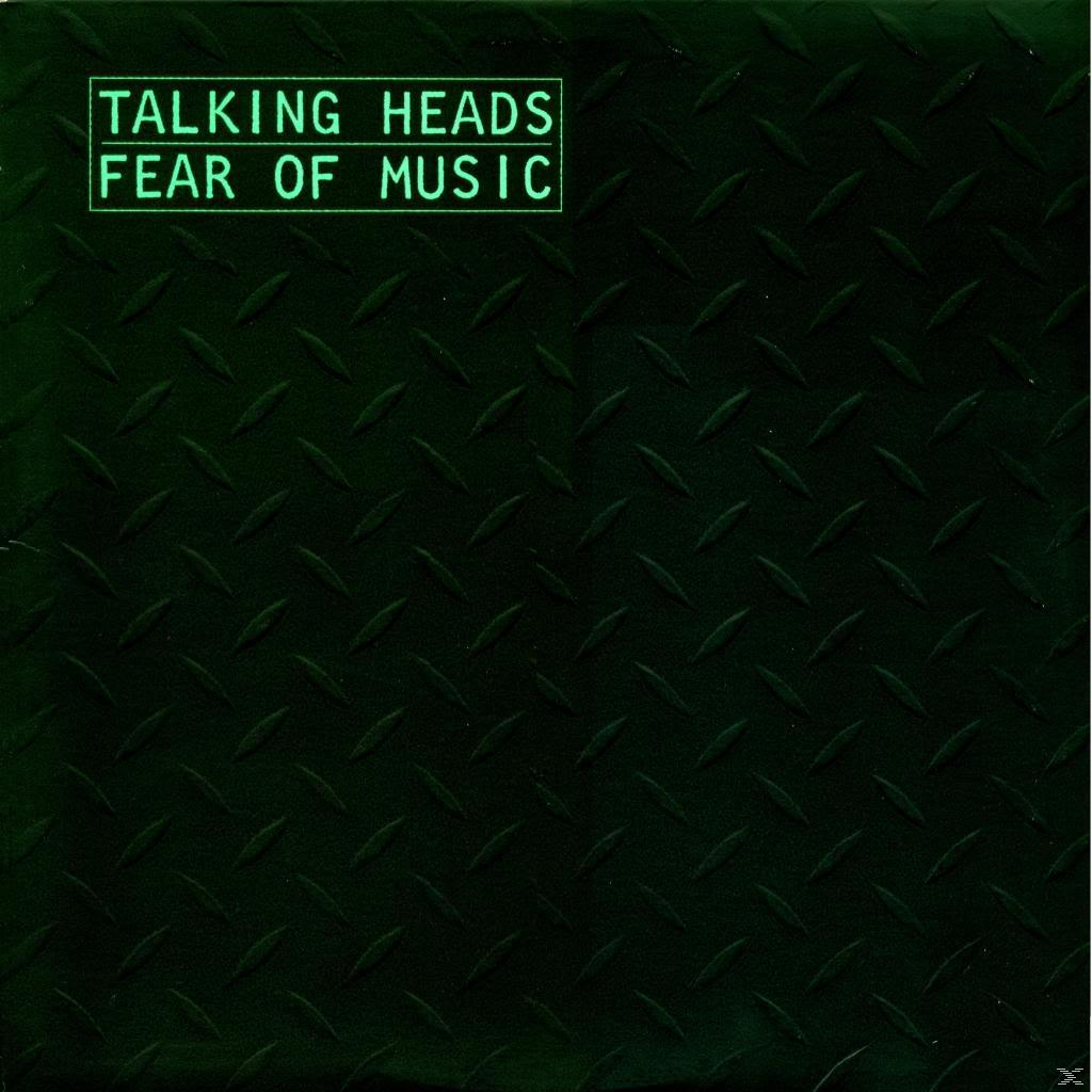 Grüner Metallplattenhintergrund mit dem Text 'TALKING HEADS FEAR OF MUSIC'.