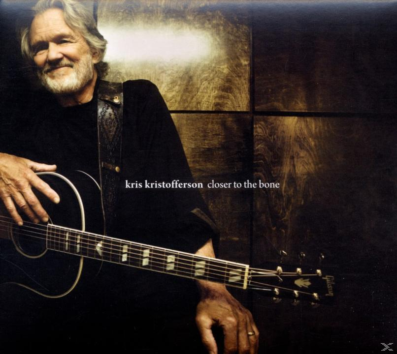 Album borító: Kris Kristofferson gitárral. Cím: closer to the bone.