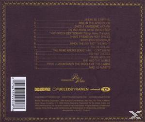 CD-Cover. Dunkelvioletter Hintergrund. Text enthält Songtitel wie 'She's a Handsome Woman'. Barcode unten.