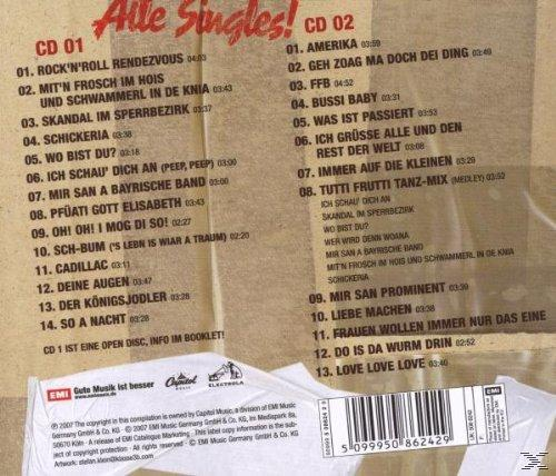 CD-Cover mit Titeln und Künstlernamen auf braunem, strukturiertem Hintergrund.