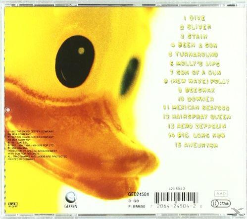 CD-Cover mit dem Gesicht einer gelben Ente und einer Titelliste.