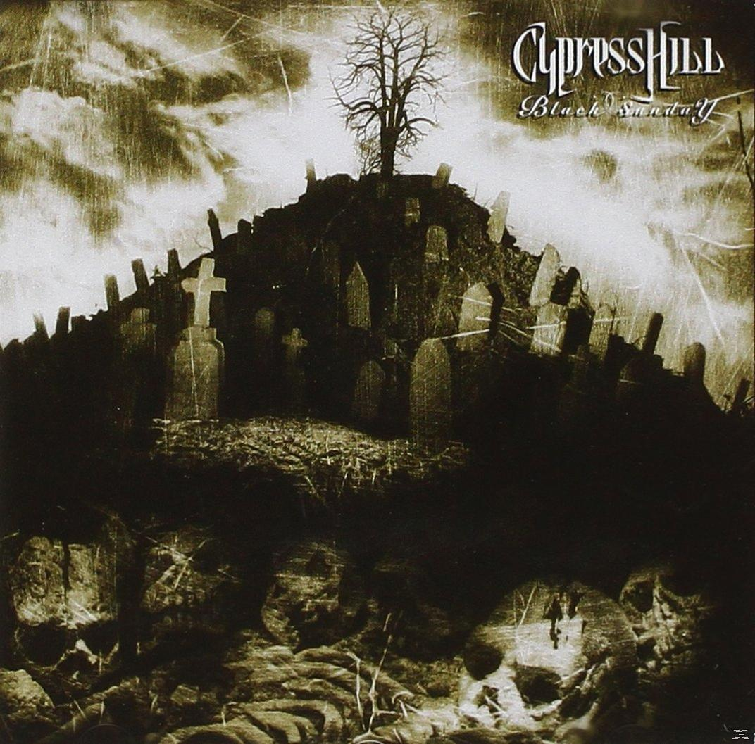 Albumcover mit Friedhof auf einem Hügel, Schädeln im Vordergrund und einem kahlen Baum.