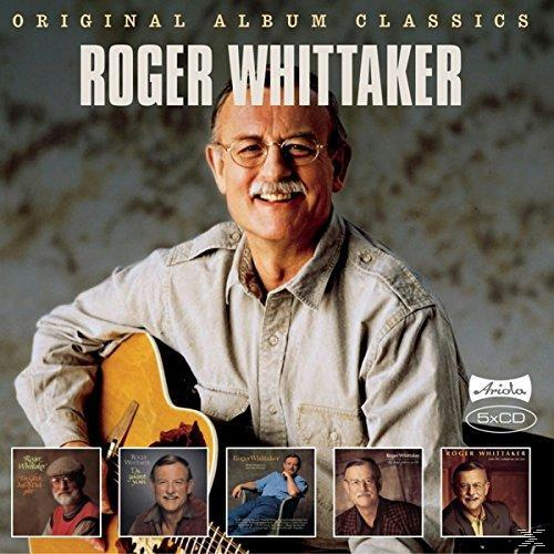 Albumcover mit lächelndem Roger Whittaker, der eine Gitarre hält, mit Albumcovern.