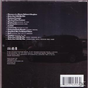 Album cover with black car on dark road, tracklist visible.