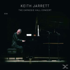 Ein Mann spielt Klavier in einem dunklen Raum. Titel: Keith Jarrett, The Carnegie Hall Concert.
