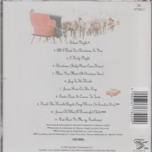 CD-Rückseite mit Weihnachtsliedern, einem Schlitten, Rentieren und einer Schneeszene.