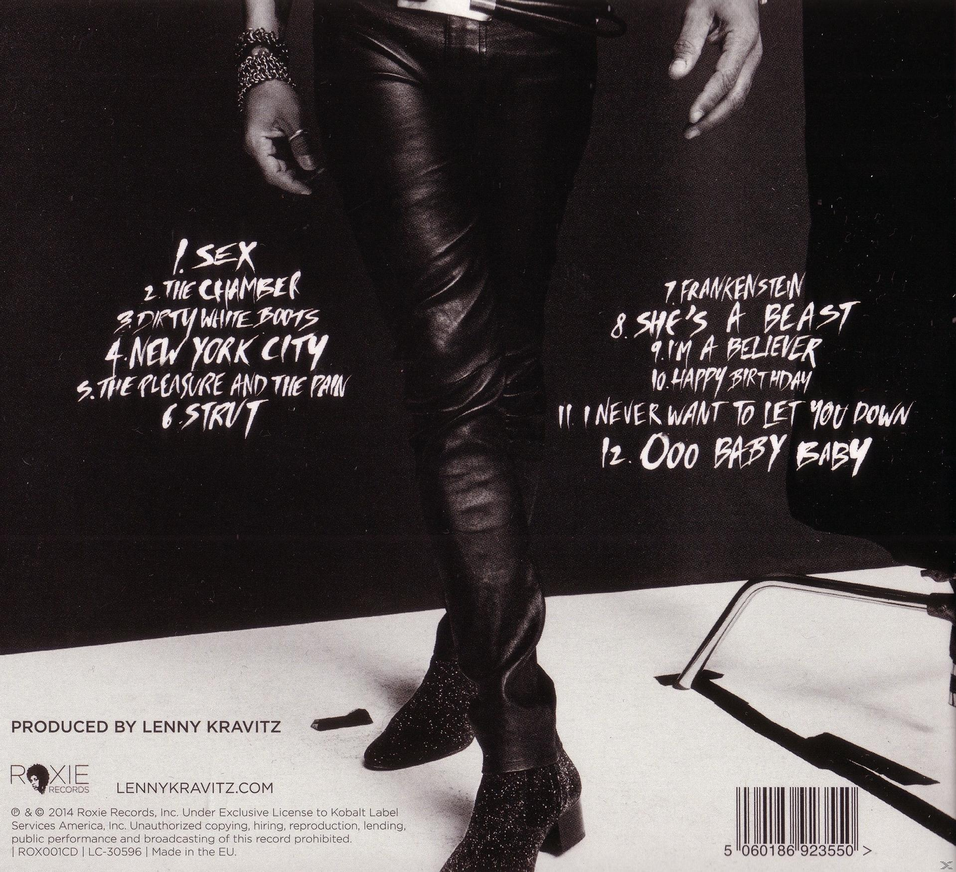 Rückseite eines Musikalbums mit Songtiteln und den Beinen einer Person in Lederhose.
