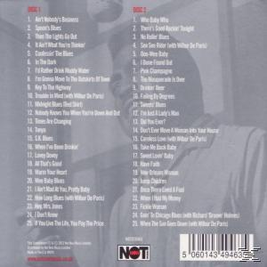 Album borítója számlistákkal. Egy fehér inges férfi a háttérben.