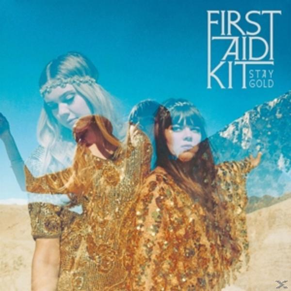 Albumcover: Drei Frauen überlagert vor einer bergigen Landschaft. Blauer Hintergrund.