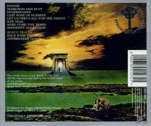 CD-Rückseite mit dunkler Landschaft, einem Schädel und einer Titelliste.