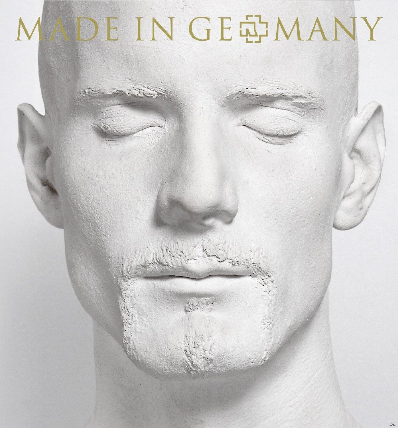 Weißes Gesicht mit geschlossenen Augen. Die Worte „MADE IN GERMANY“ und ein Bandlogo stehen oben.