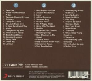 CD-Hülle mit Titellisten in drei Spalten. Enthält Songtitel, Columbia- und Sony Music-Logos und einen Barcode.