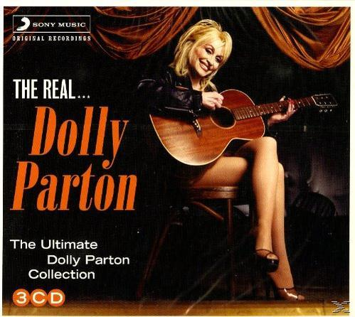 Albumcover mit Dolly Parton, einer Gitarre und dem Text 'The Real Dolly Parton'.