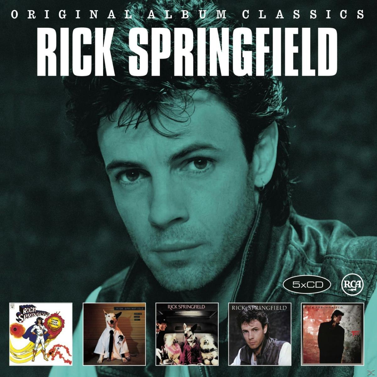 Albumcover von Rick Springfield. Das Gesicht eines Mannes ist in der Mitte. Albumcover sind unten.
