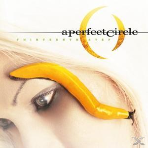 Ein CD-Cover mit einem Auge einer Frau und einer großen gelben Schnecke auf ihrem Gesicht.