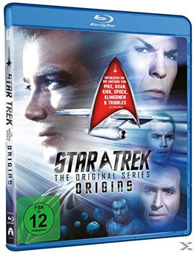 DVD-Cover: Star Trek-Serie mit Gesichtern von Charakteren. Blaue und schwarze Farben.
