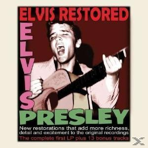 Elvis Presley CD borítója. Elvis éneklő képe, piros és fehér szöveg. Barnás háttér.
