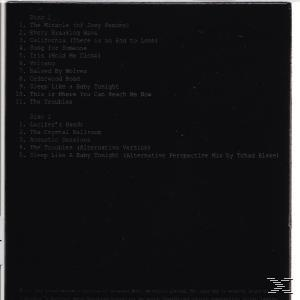 CD-Rückseite, schwarzer Hintergrund, Songtitel sind aufgelistet. Text ist weiß.