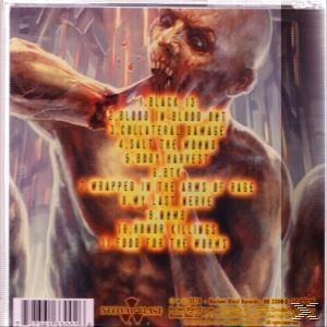 Die Rückseite einer CD mit einem Zombie und Songtiteln in einem Horrorthema.