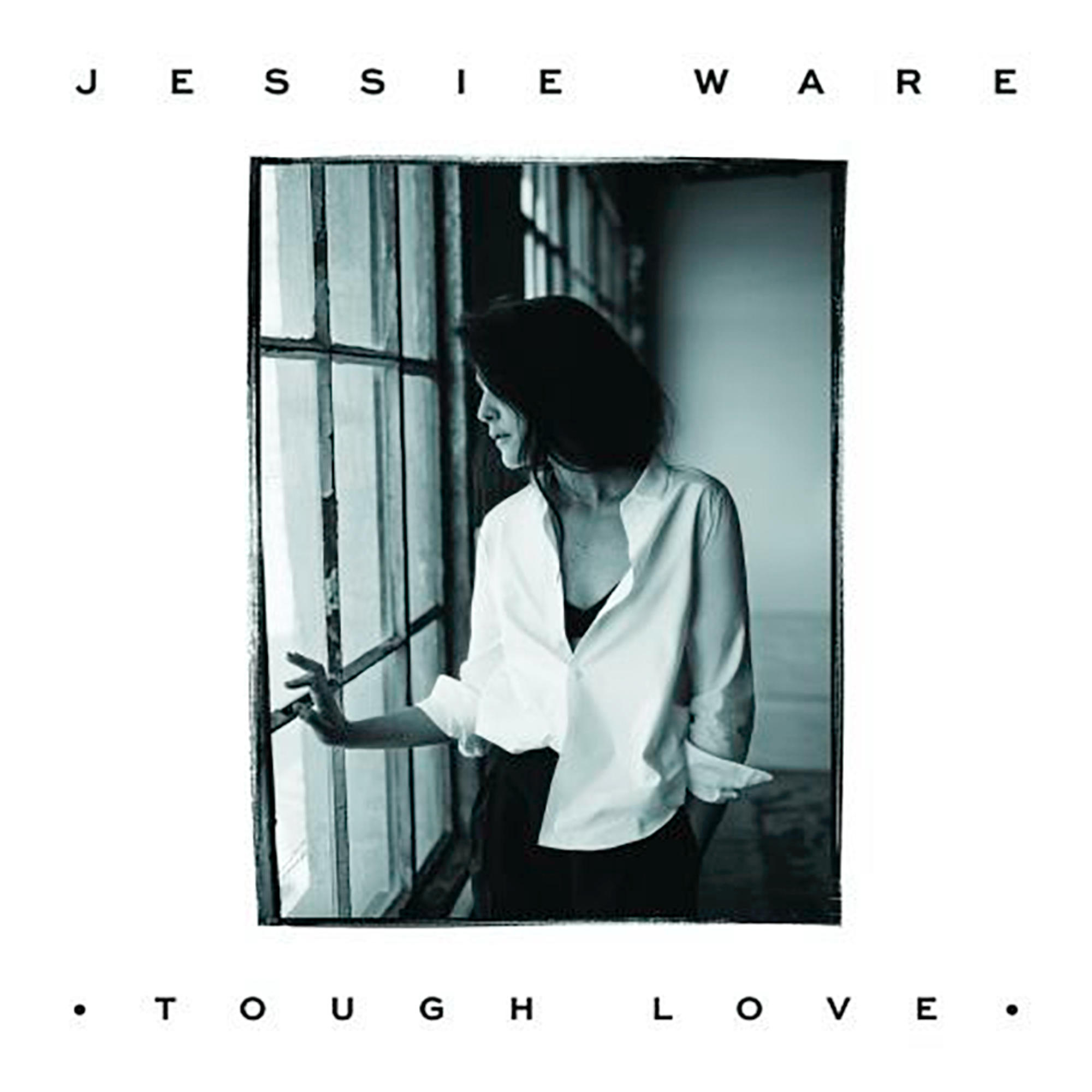 Album borító: Jessie Ware, egy fehér inges nő kinéz az ablakon, alatta az album címe.