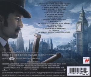 Férfi cilinderben, londoni égbolt Big Bennel a háttérben.