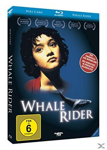DVD-Cover: Whale Rider. Das Gesicht eines jungen Mädchens auf blauem Hintergrund. Ein Wal unten.
