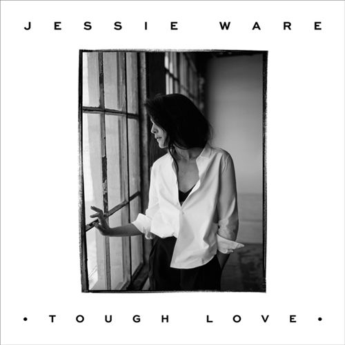 Album borító: Fekete-fehér fotó egy nőről az ablaknál. 'Tough Love' felirat.