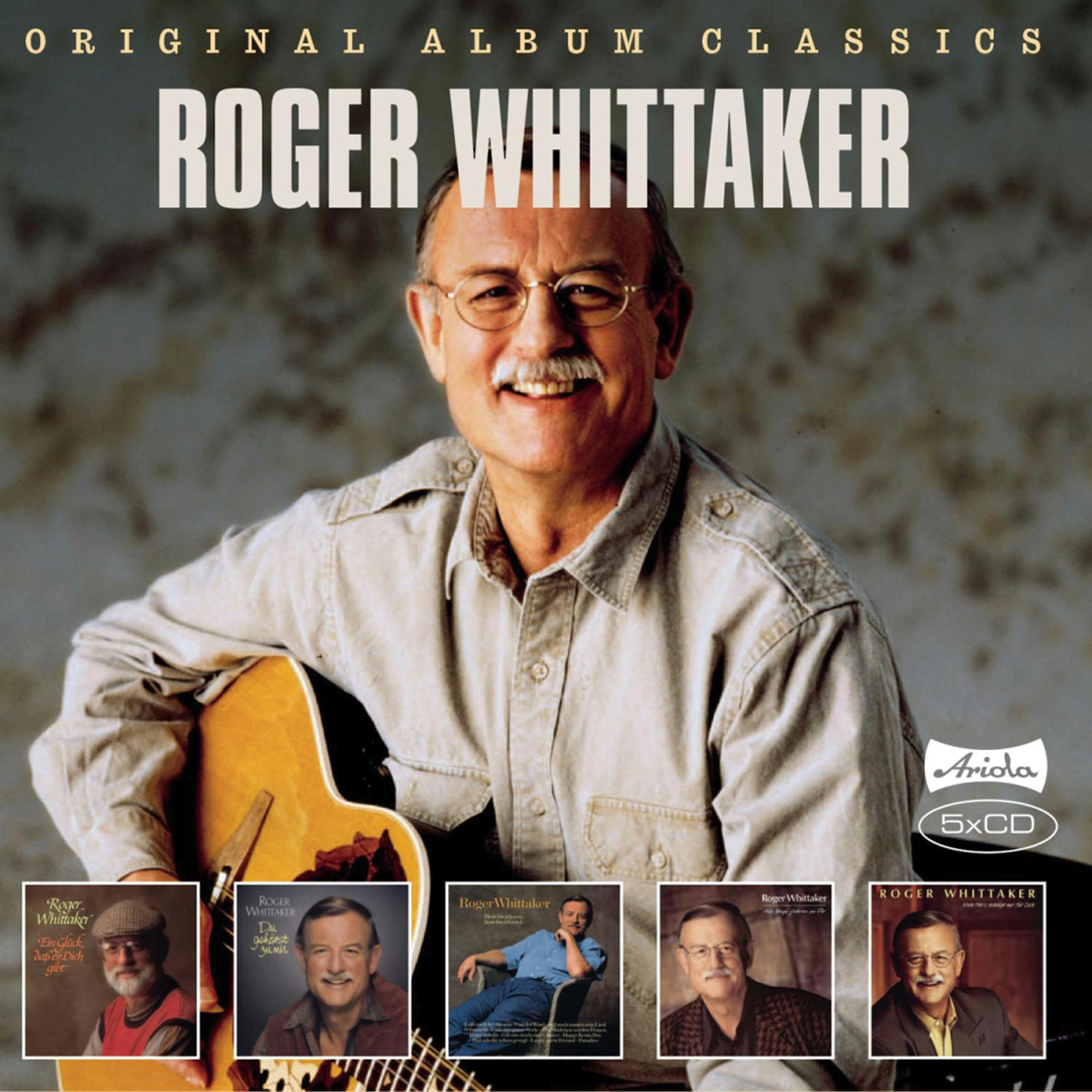 Albumcover: Roger Whittaker lächelt, mit Gitarre, und Albumcover.
