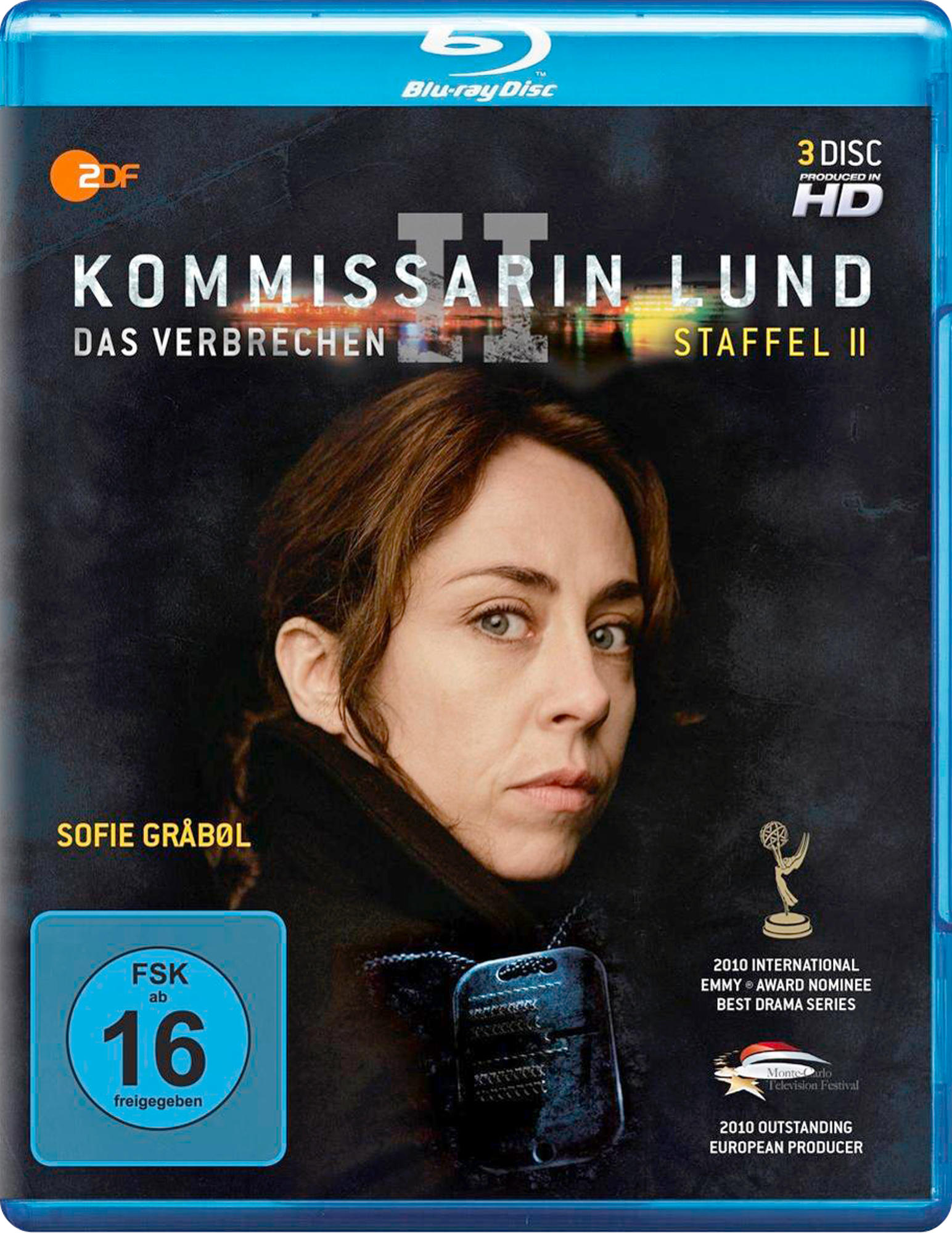 Blu-ray-Cover für 'Kommissarin Lund II'. Zeigt das Gesicht einer Frau vor dunklem Hintergrund.