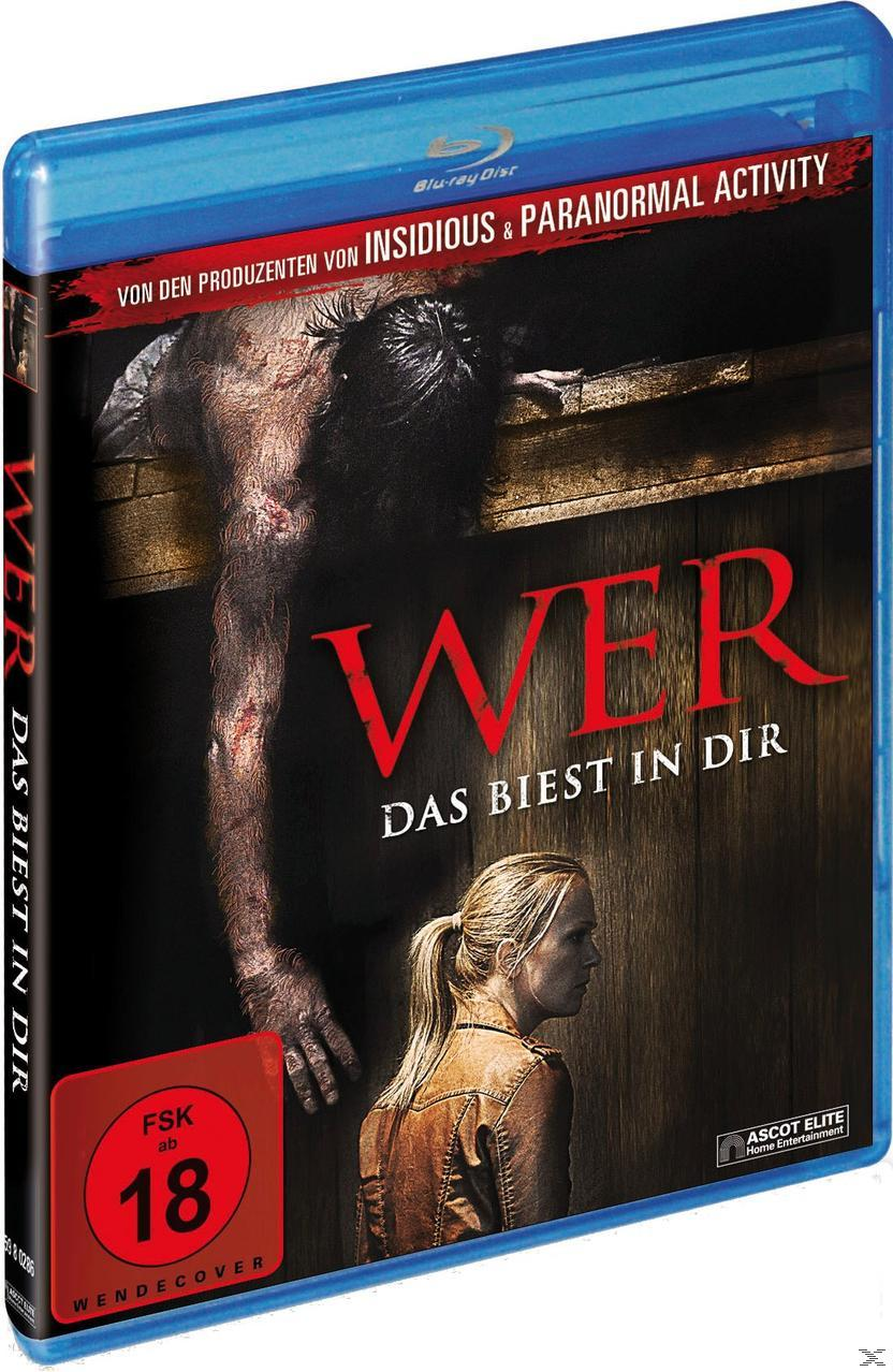 WER DVD-Cover. Eine Frau blickt auf ein Monster zurück. Dunkler Hintergrund mit Warnhinweis.