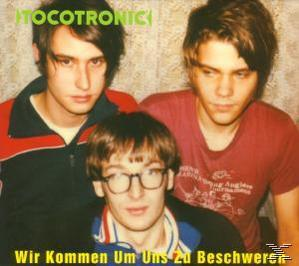 Albumcover: Drei Männer schauen in die Kamera.