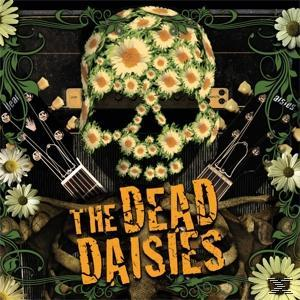 Albumcover. Totenkopf aus Gänseblümchen, Gitarren und Skelett. Titel: The Dead Daisies.
