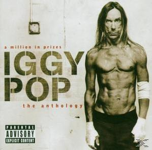 Albumcover mit Iggy Pop. Er ist oben ohne und steht vor einer Wand.