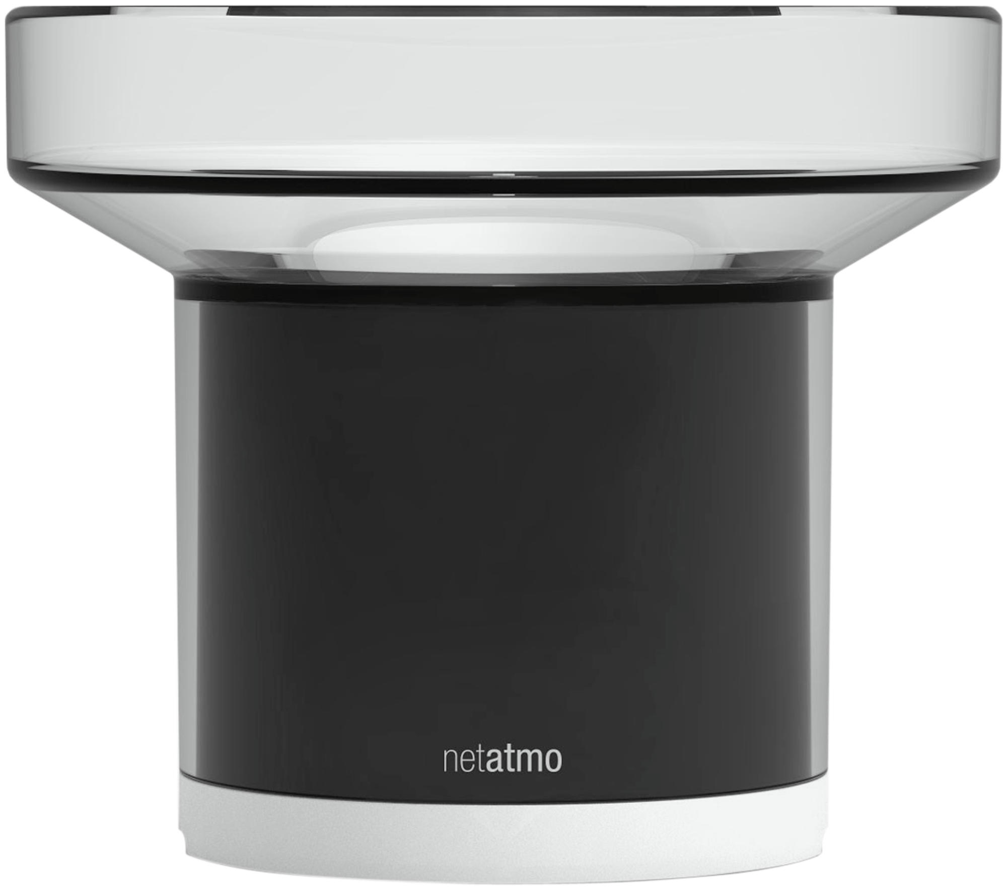 Station météo blanche et noire avec un dessus en verre. Le logo est 'netatmo'.