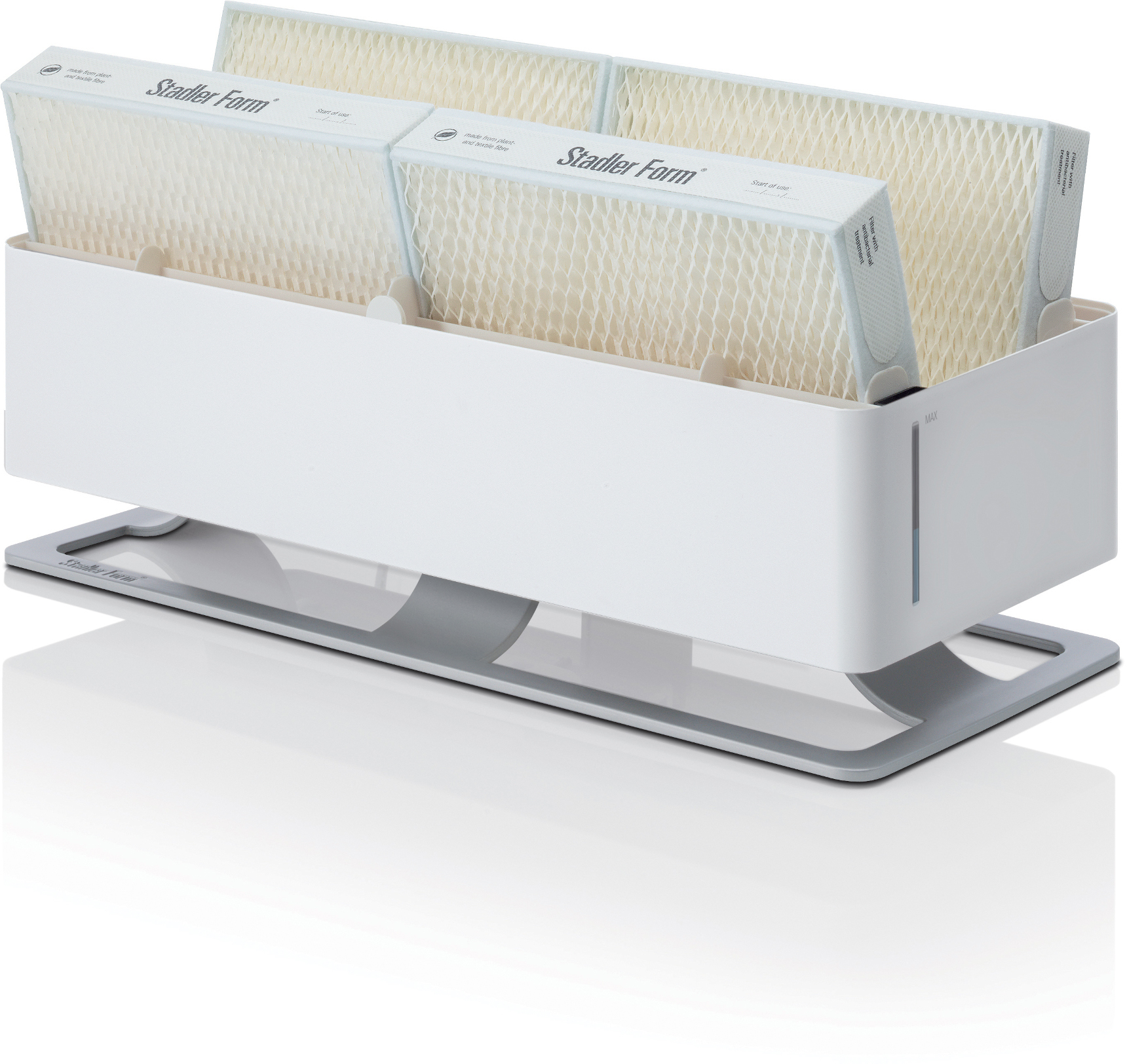 Umidificatore bianco con più cartucce filtranti. La base è argentata.