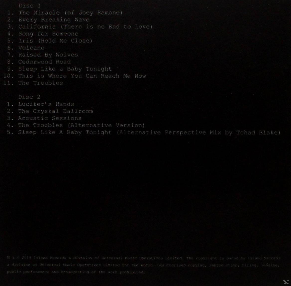 Album-Rückseite, schwarzer Hintergrund, Titelliste von zwei Discs. Text ist weiß, mit Credits unten.