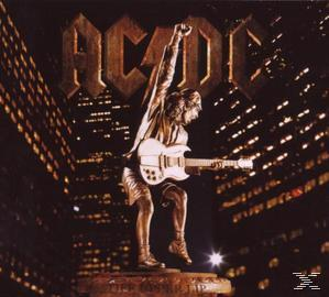 Albumcover mit einer Statue eines Mannes, der Gitarre spielt.