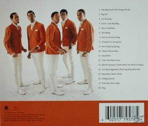 Fünf Männer in orangefarbenen Anzügen, weißen Hosen, stehend. Albumcover mit Songtiteln und Barcode.