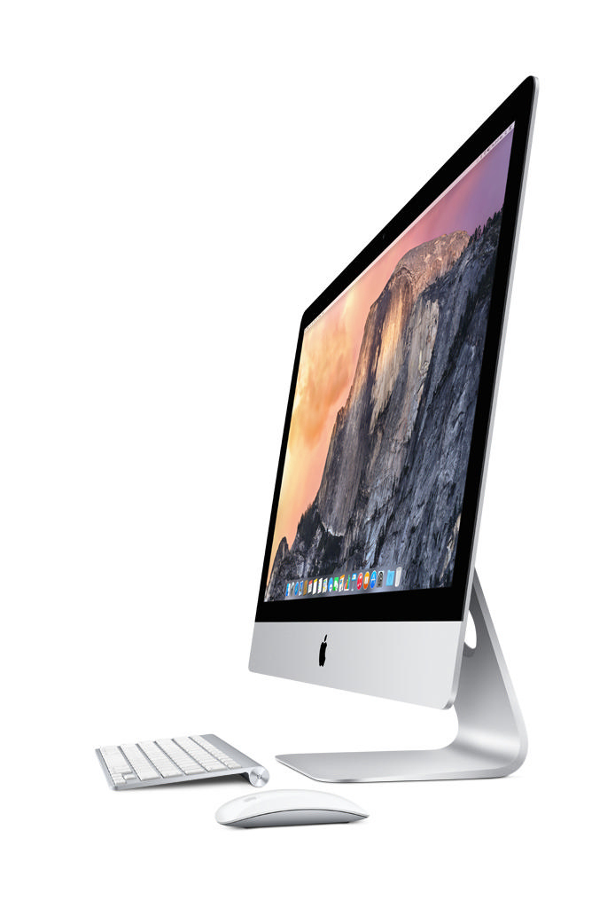 Apple iMac Desktop-Computer. Silberner Rahmen mit großem Bildschirm, der eine Berglandschaft, eine Tastatur und eine Maus zeigt.
